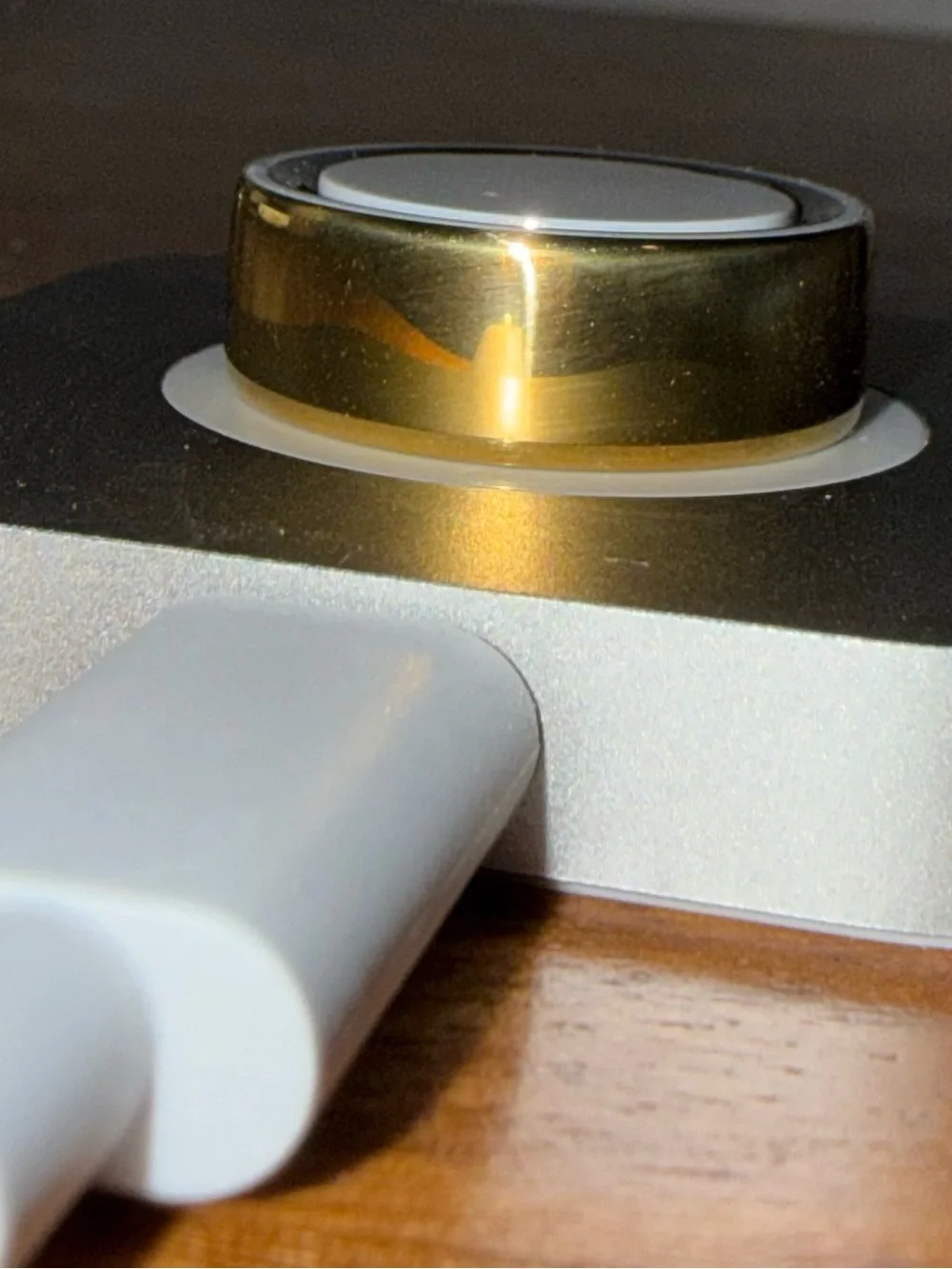 Oura Gold Smart Ring Charger Accent